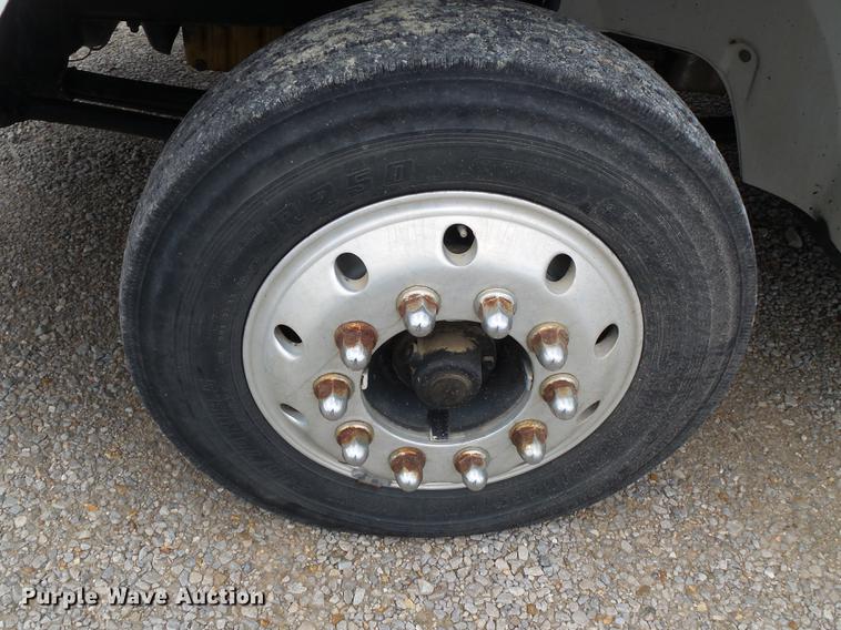 image for item DB7114 2004 Freightliner FL70 flatbed truck