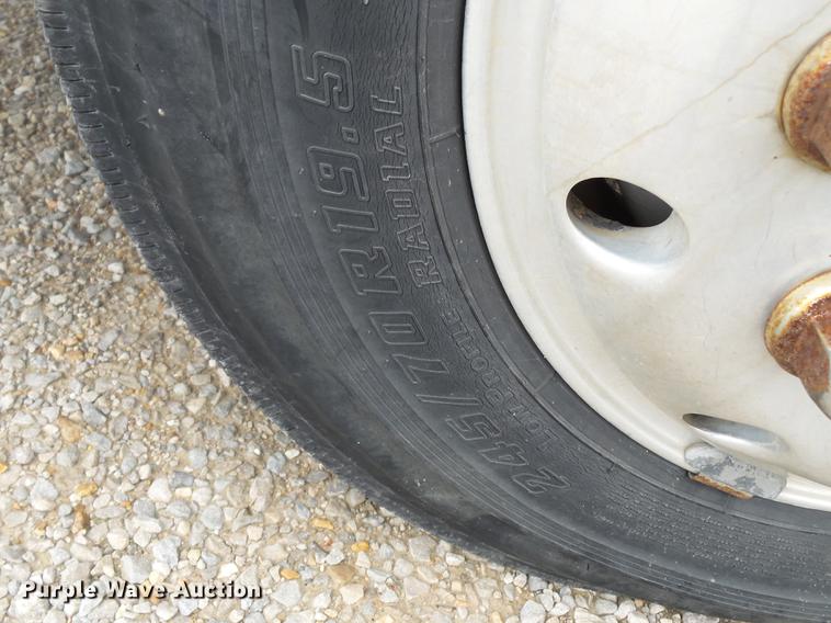 image for item DB7114 2004 Freightliner FL70 flatbed truck