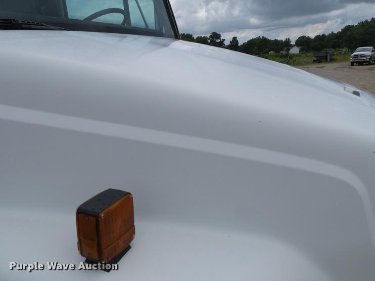 image for item DB7114 2004 Freightliner FL70 flatbed truck