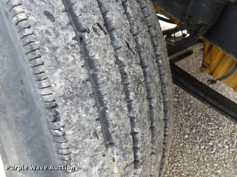 image for item DB7114 2004 Freightliner FL70 flatbed truck