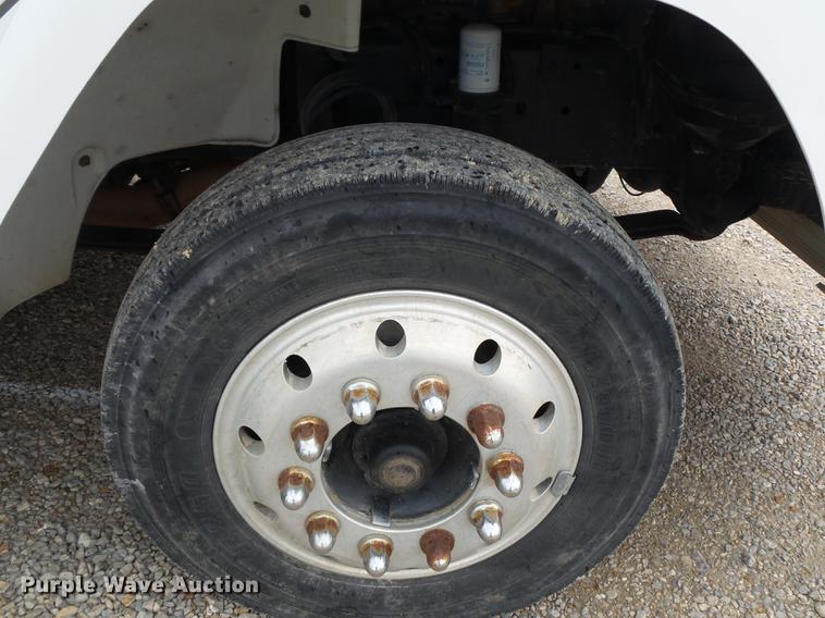 image for item DB7114 2004 Freightliner FL70 flatbed truck