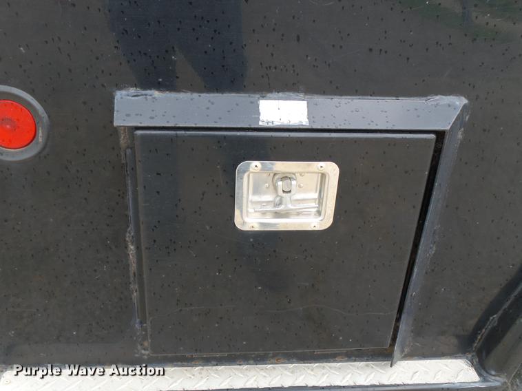 image for item DB7114 2004 Freightliner FL70 flatbed truck