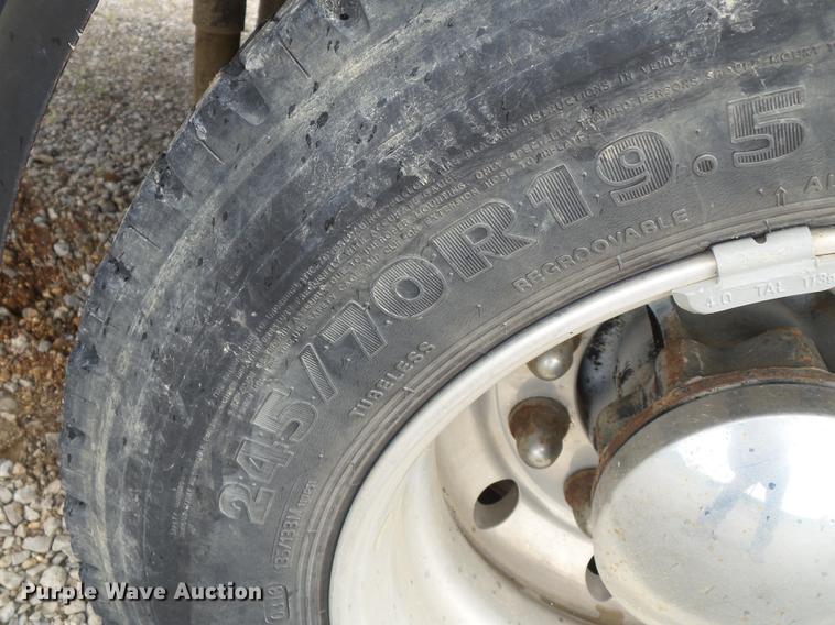 image for item DB7114 2004 Freightliner FL70 flatbed truck