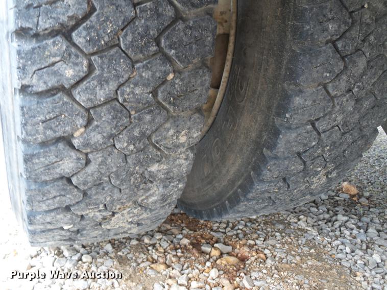 image for item DB7114 2004 Freightliner FL70 flatbed truck