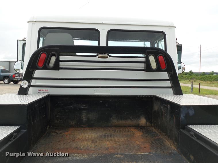 image for item DB7114 2004 Freightliner FL70 flatbed truck