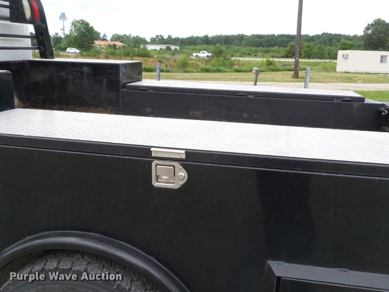 image for item DB7114 2004 Freightliner FL70 flatbed truck