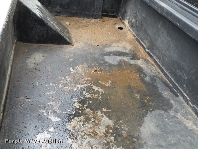 image for item DB7114 2004 Freightliner FL70 flatbed truck