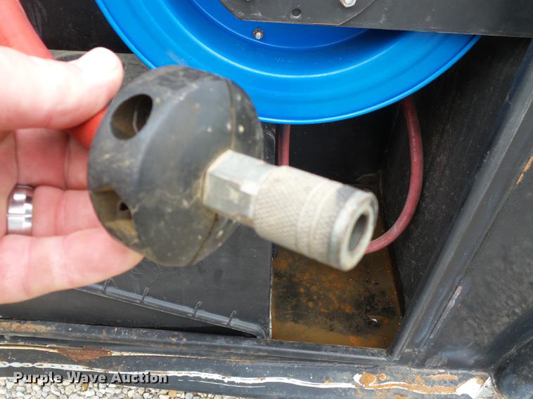 image for item DB7114 2004 Freightliner FL70 flatbed truck