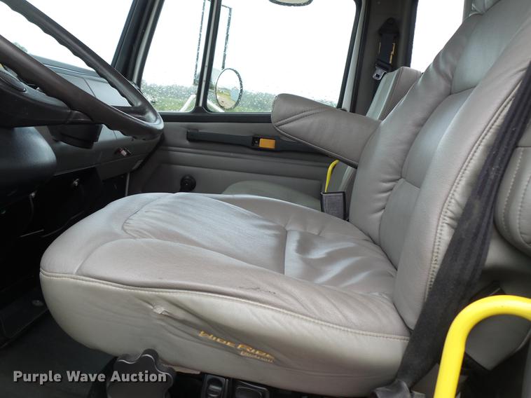 image for item DB7114 2004 Freightliner FL70 flatbed truck