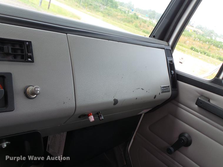 image for item DB7114 2004 Freightliner FL70 flatbed truck