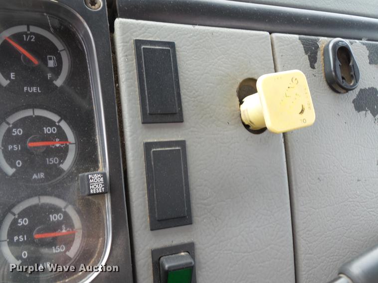 image for item DB7114 2004 Freightliner FL70 flatbed truck