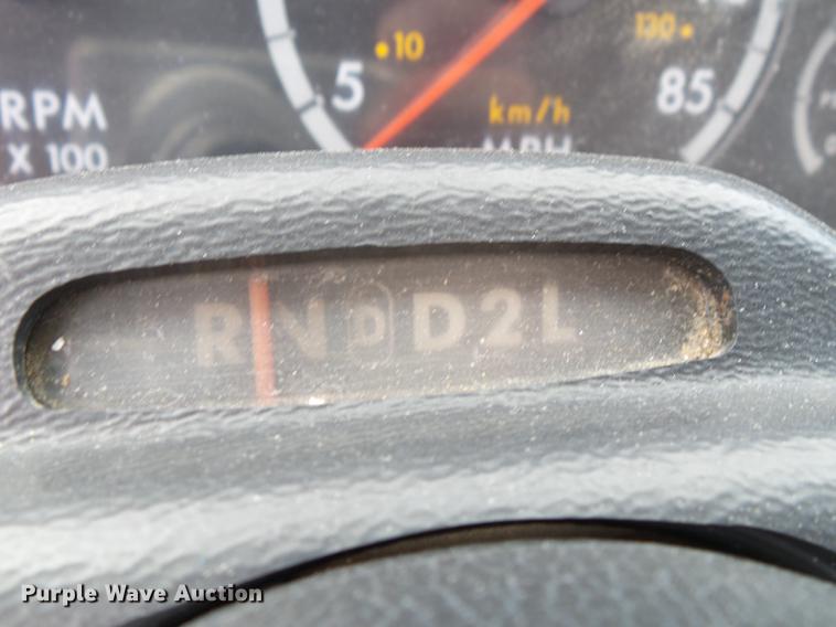 image for item DB7114 2004 Freightliner FL70 flatbed truck