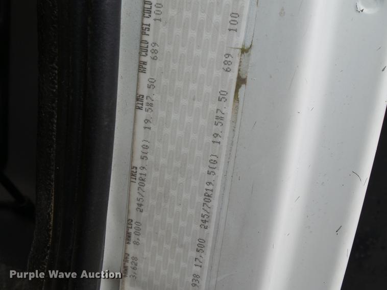 image for item DB7114 2004 Freightliner FL70 flatbed truck