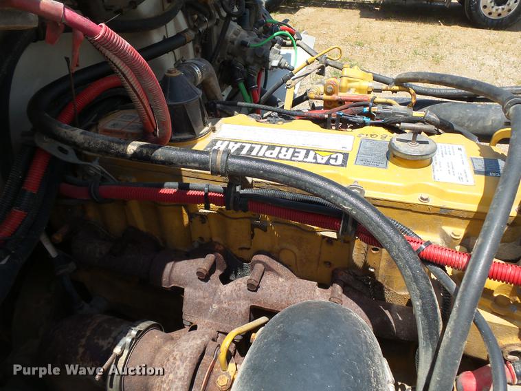 image for item DB7114 2004 Freightliner FL70 flatbed truck