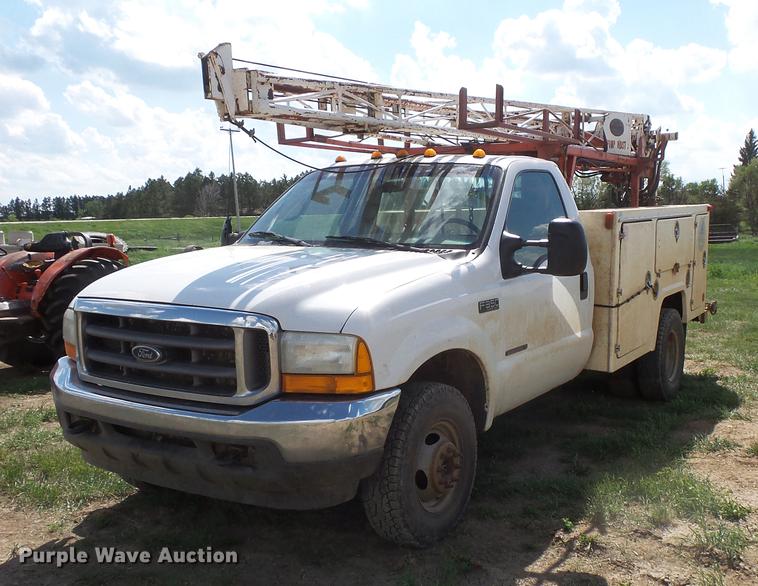 image for item DC4718 2001 Ford F350 Super Duty utility bed pickup truck with Jessen pump hoist