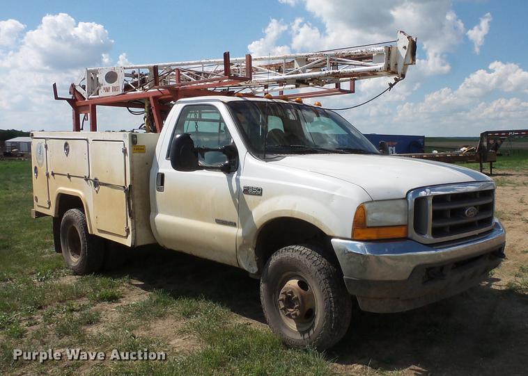 image for item DC4718 2001 Ford F350 Super Duty utility bed pickup truck with Jessen pump hoist