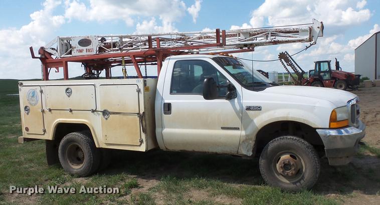 image for item DC4718 2001 Ford F350 Super Duty utility bed pickup truck with Jessen pump hoist