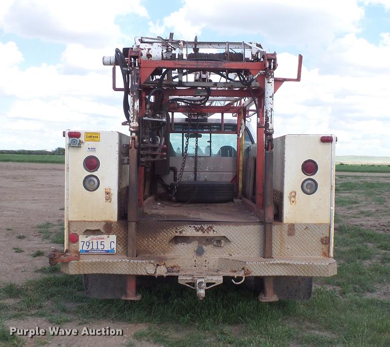 image for item DC4718 2001 Ford F350 Super Duty utility bed pickup truck with Jessen pump hoist