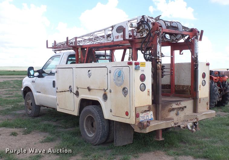 image for item DC4718 2001 Ford F350 Super Duty utility bed pickup truck with Jessen pump hoist