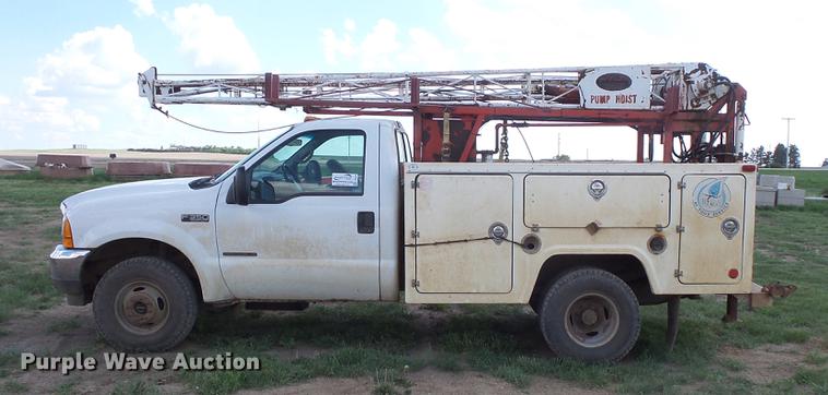 image for item DC4718 2001 Ford F350 Super Duty utility bed pickup truck with Jessen pump hoist
