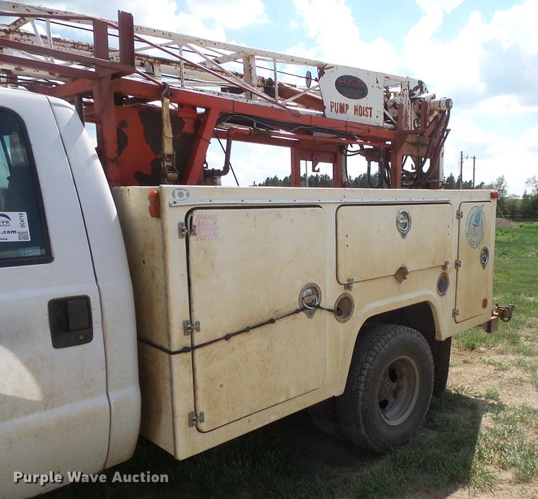 image for item DC4718 2001 Ford F350 Super Duty utility bed pickup truck with Jessen pump hoist