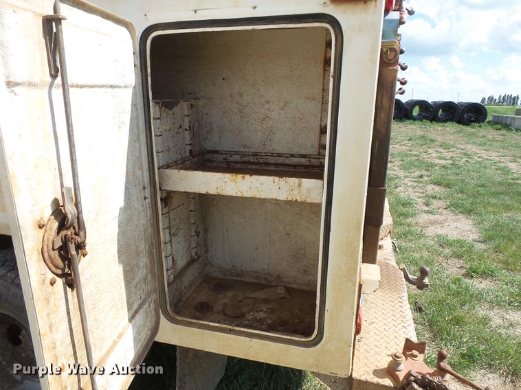 image for item DC4718 2001 Ford F350 Super Duty utility bed pickup truck with Jessen pump hoist