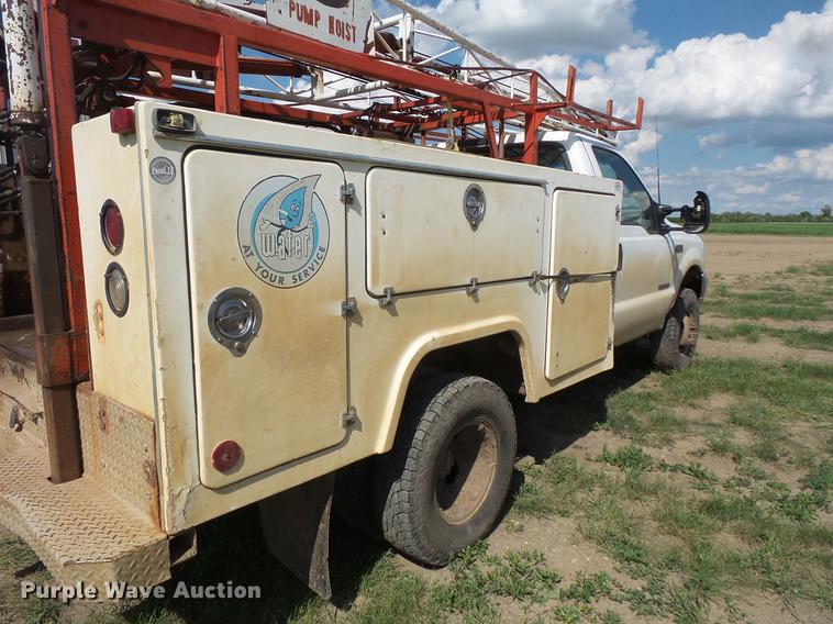 image for item DC4718 2001 Ford F350 Super Duty utility bed pickup truck with Jessen pump hoist