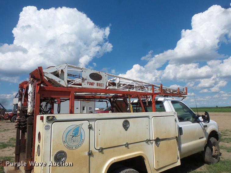 image for item DC4718 2001 Ford F350 Super Duty utility bed pickup truck with Jessen pump hoist