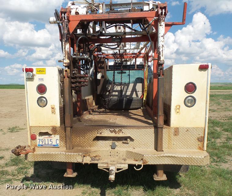 image for item DC4718 2001 Ford F350 Super Duty utility bed pickup truck with Jessen pump hoist