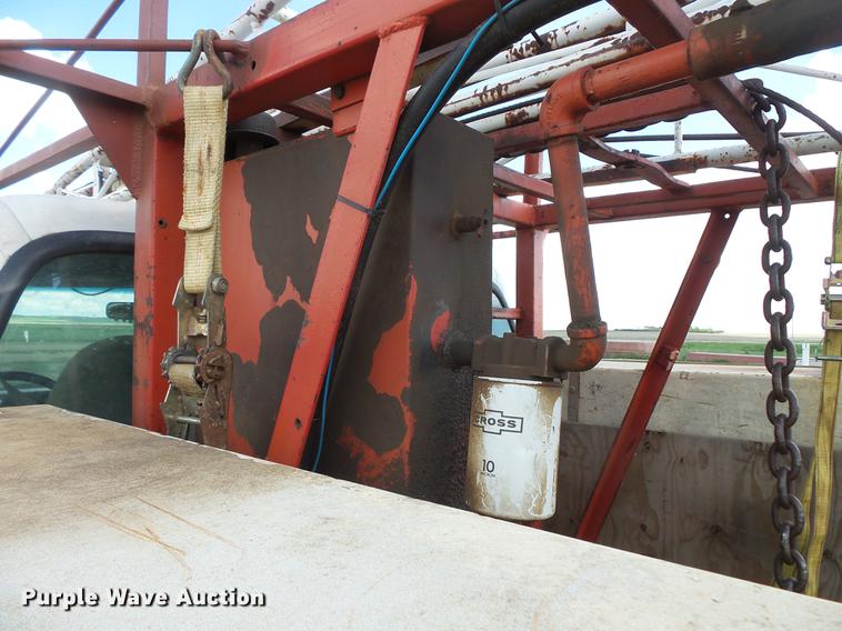 image for item DC4718 2001 Ford F350 Super Duty utility bed pickup truck with Jessen pump hoist