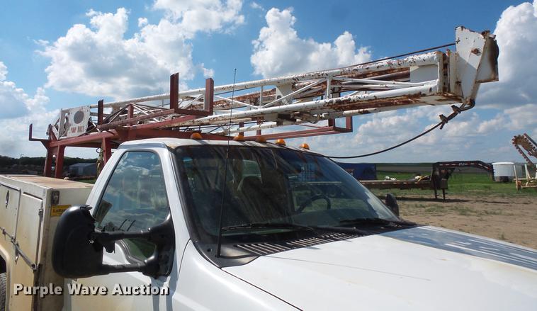 image for item DC4718 2001 Ford F350 Super Duty utility bed pickup truck with Jessen pump hoist