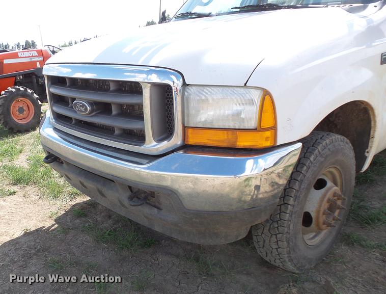 image for item DC4718 2001 Ford F350 Super Duty utility bed pickup truck with Jessen pump hoist