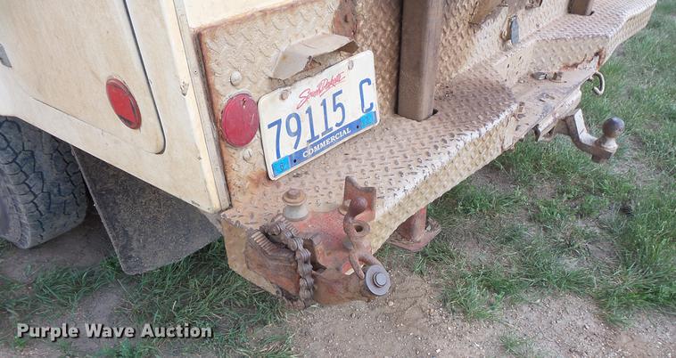 image for item DC4718 2001 Ford F350 Super Duty utility bed pickup truck with Jessen pump hoist