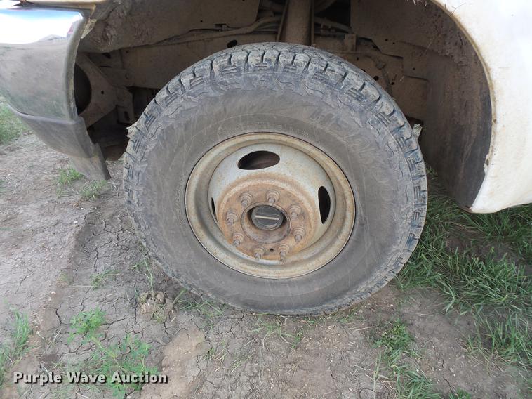 image for item DC4718 2001 Ford F350 Super Duty utility bed pickup truck with Jessen pump hoist