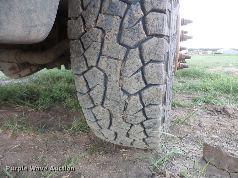 image for item DC4718 2001 Ford F350 Super Duty utility bed pickup truck with Jessen pump hoist