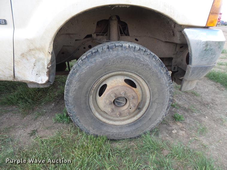 image for item DC4718 2001 Ford F350 Super Duty utility bed pickup truck with Jessen pump hoist