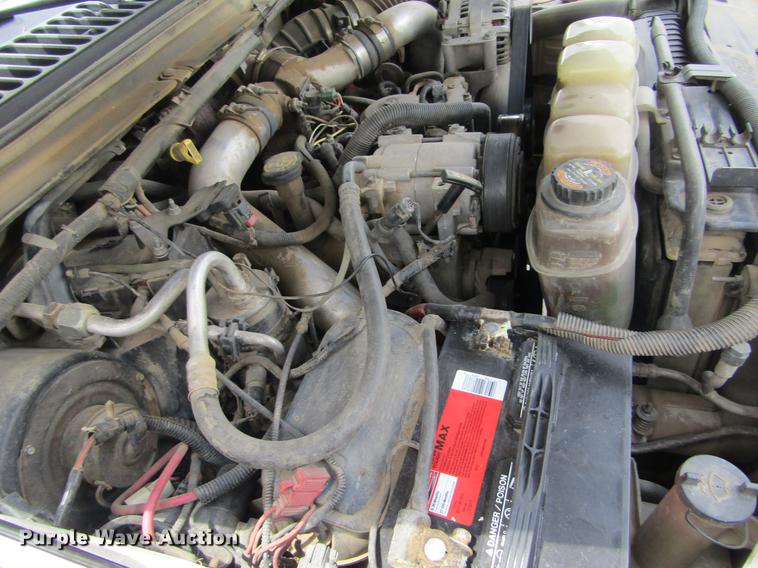 image for item DD5753 1999 Ford F350 Super Duty XLT Crew Cab bale bed pickup truck