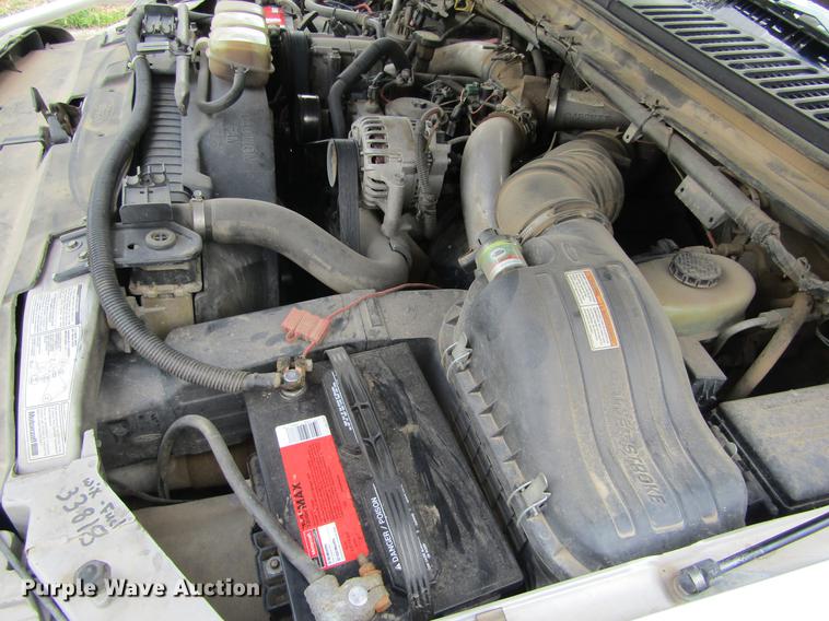 image for item DD5753 1999 Ford F350 Super Duty XLT Crew Cab bale bed pickup truck