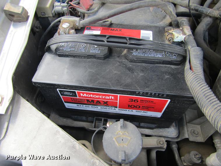 image for item DD5753 1999 Ford F350 Super Duty XLT Crew Cab bale bed pickup truck