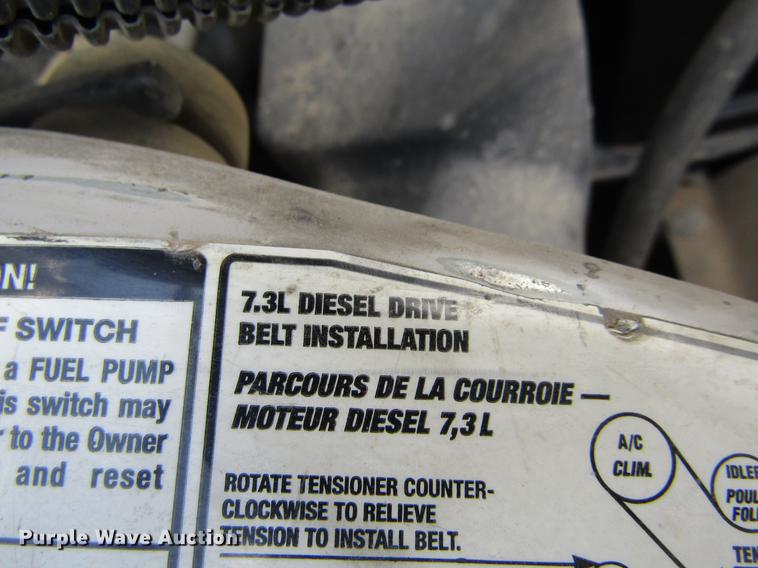 image for item DD5753 1999 Ford F350 Super Duty XLT Crew Cab bale bed pickup truck