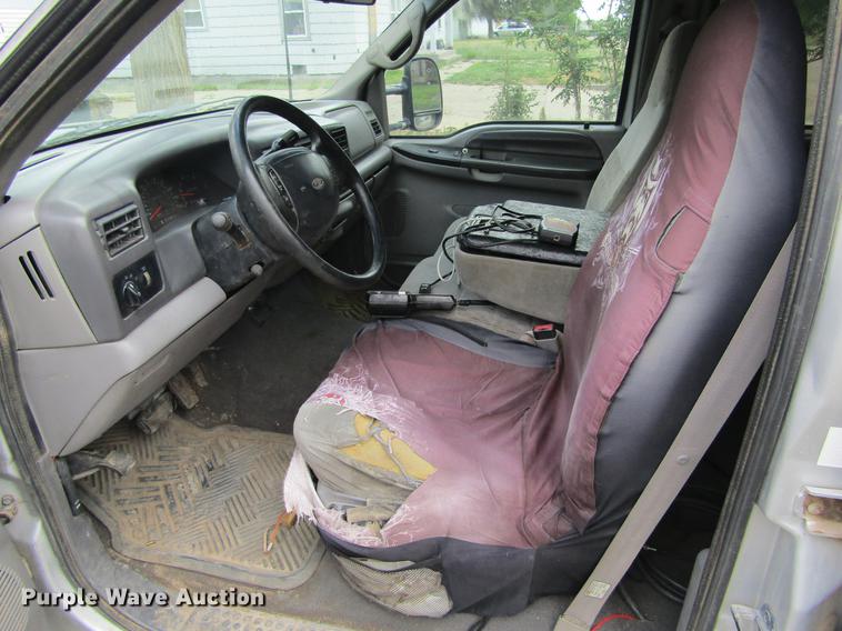 image for item DD5753 1999 Ford F350 Super Duty XLT Crew Cab bale bed pickup truck