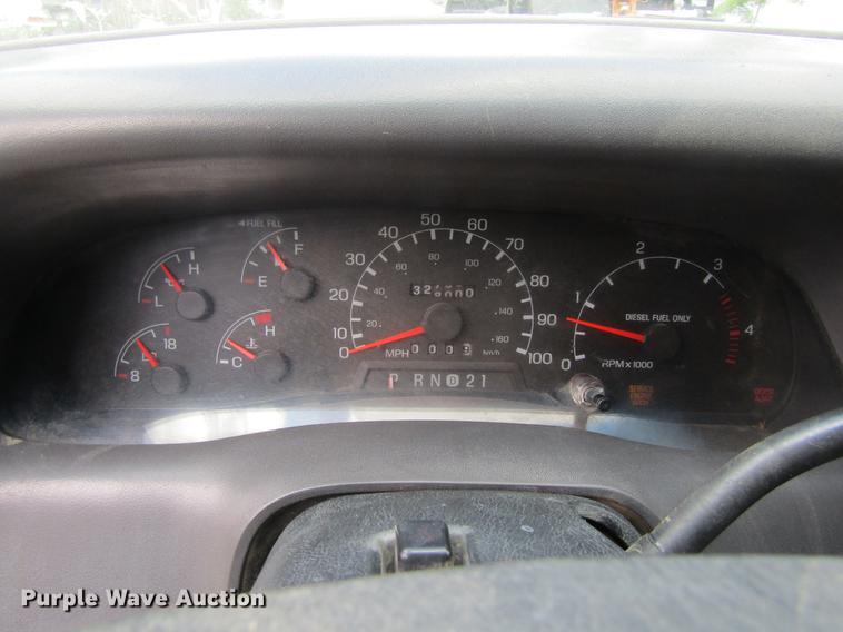 image for item DD5753 1999 Ford F350 Super Duty XLT Crew Cab bale bed pickup truck