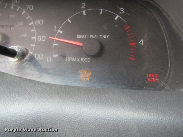 image for item DD5753 1999 Ford F350 Super Duty XLT Crew Cab bale bed pickup truck