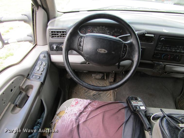 image for item DD5753 1999 Ford F350 Super Duty XLT Crew Cab bale bed pickup truck