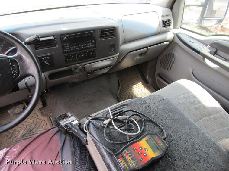 image for item DD5753 1999 Ford F350 Super Duty XLT Crew Cab bale bed pickup truck