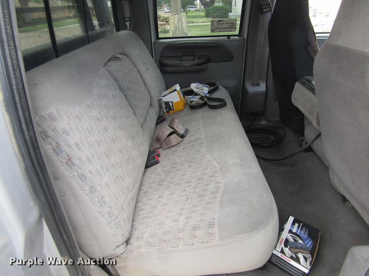 image for item DD5753 1999 Ford F350 Super Duty XLT Crew Cab bale bed pickup truck