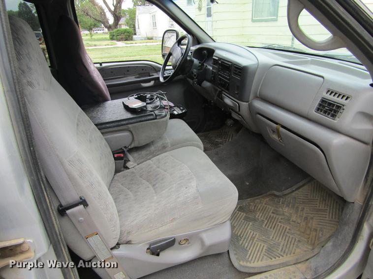 image for item DD5753 1999 Ford F350 Super Duty XLT Crew Cab bale bed pickup truck