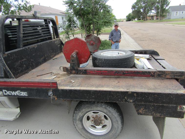 image for item DD5753 1999 Ford F350 Super Duty XLT Crew Cab bale bed pickup truck