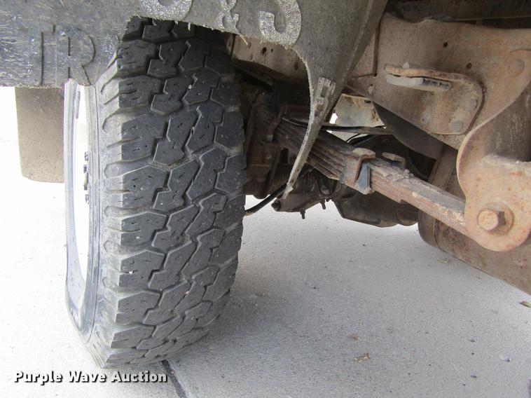 image for item DD5753 1999 Ford F350 Super Duty XLT Crew Cab bale bed pickup truck