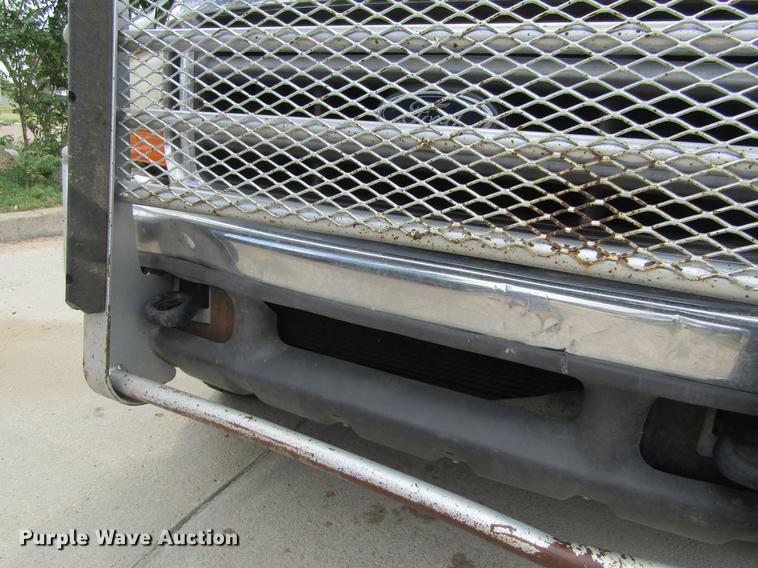 image for item DD5753 1999 Ford F350 Super Duty XLT Crew Cab bale bed pickup truck